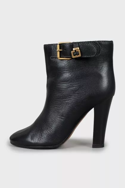 Leather ankle boots with gold buckle