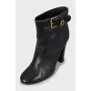 Leather ankle boots with gold buckle