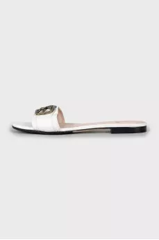 Leather slides with metal logo