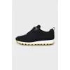 Black textile sneakers