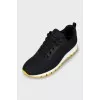 Black textile sneakers