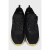 Black textile sneakers