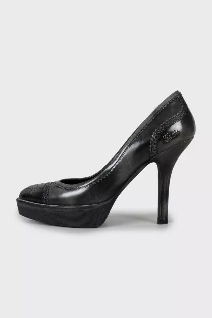 Perforated leather heels