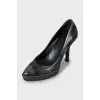 Perforated leather heels