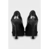 Perforated leather heels