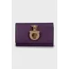 Leather key holder with gold-tone fittings