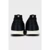 Textile sneakers with embossed pattern