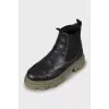Leather boots with accent sole