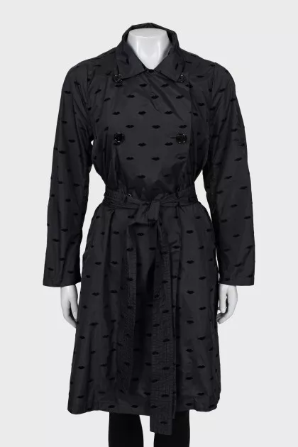 Black raincoat with embossed print