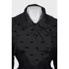 Black raincoat with embossed print