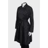 Black raincoat with embossed print