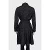 Black raincoat with embossed print