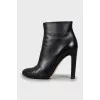 Black leather ankle boots