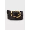Leather belt with gold buckle