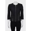 Fitted jacket decorated with lacing