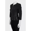 Fitted jacket decorated with lacing