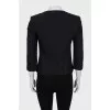 Fitted jacket decorated with lacing