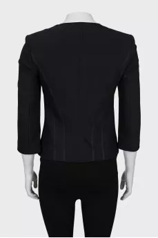 Fitted jacket decorated with lacing