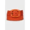 Orange patent leather belt