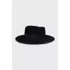 Black hat with metallic decoration