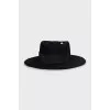 Black hat with metallic decoration