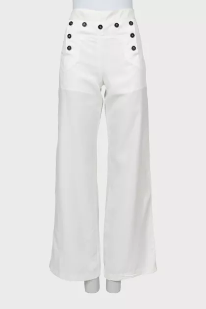 Palazzo trousers decorated with buttons