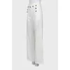 Palazzo trousers decorated with buttons