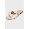Leather slippers with decor