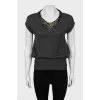 Knitted vest decorated with rhinestones