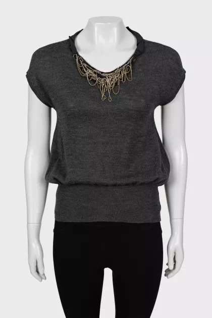 Knitted vest decorated with rhinestones