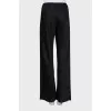 Silk trousers with elastic band and tag