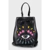 Bucket bag with embroidered print
