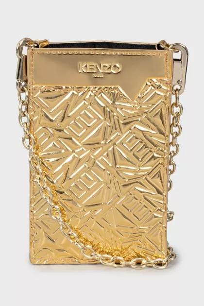 Gold-tone phone case on a chain