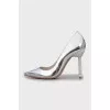 Silver shoes with decorative heels