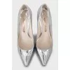 Silver shoes with decorative heels