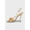 Sandals with decorative high heels