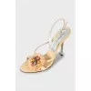 Sandals with decorative high heels