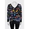 Printed pullover decorated with fur