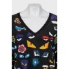 Printed pullover decorated with fur