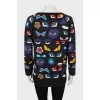 Printed pullover decorated with fur