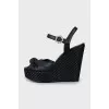 Black woven wedge sandals