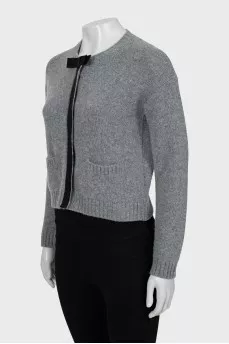 Knitted cardigan decorated with a bow