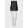 Leather mini skirt with tag