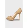 Beige patent leather shoes