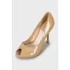 Beige patent leather shoes