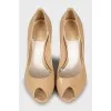 Beige patent leather shoes