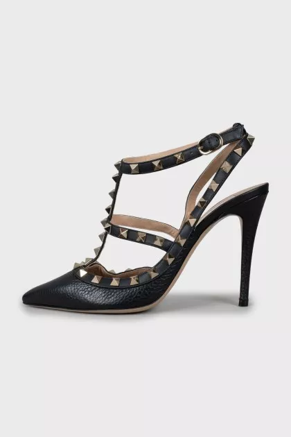 Leather shoes decorated with spikes