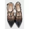 Leather shoes decorated with spikes