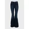 Flared jeans with gold shimmer