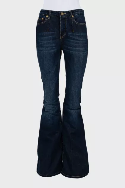 Flared jeans with gold shimmer